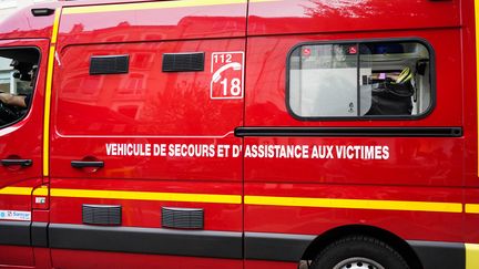 Les deux enfants du couple, âgés d'une dizaine d'années, n'ont pas assisté à la scène. (LAURE BOYER / HANS LUCAS via AFP)