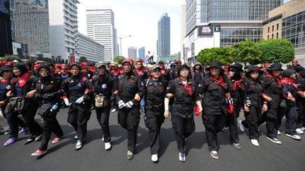 Manifestants à Djakarta (Indonésie) lors du 1er mai (AFP/Adek Berry)