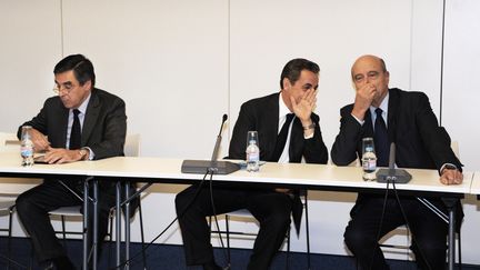 Fran&ccedil;ois Fillon, Nicolas Sarkozy et Alain Jupp&eacute; au QG de l'UMP &agrave; Paris.&nbsp; (DOMINIQUE FAGET / POOL)