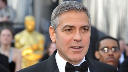 Geerge Clooney sur le tapis rouge des 84e Oscars, le 26 février 2012
 (JOE KLAMAR/AFP)