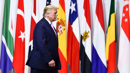 Le président américain Donald Trump, le 28 juin 2019, lors de son arrivée au Sommet du G20, à Osaka (Japon). (BRENDAN SMIALOWSKI / AFP)