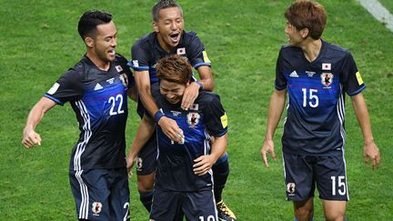 Les Japonais euphoriques après leur qualification pour la Coupe du Monde 2018 en Russie. (MASANORI INAGAKI / YOMIURI)