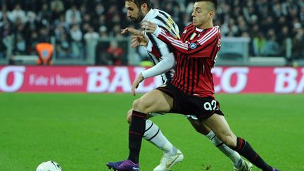 Vucinic (Juventus) et El Shaarawy (Milan AC) (OLIVIER MORIN / AFP)