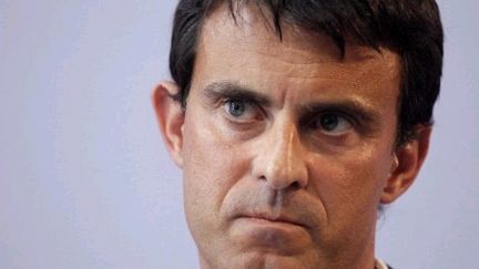 Manuel Valls assure que Dominique Strauss-Kahn "reste" son "ami". (AFP - Patrick Kovarik)