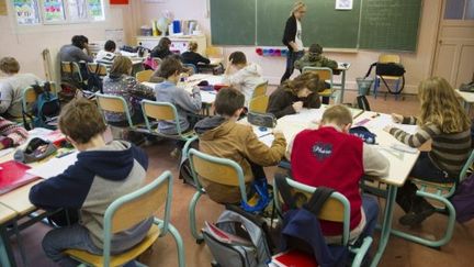 Dans une école primaire de la régioon parisienne... (AFP - BORIS HORVAT)