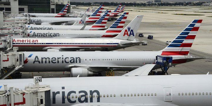 La croissance du transport aérien : plus de 3 milliards de passagers en 2014. (ROBYN BECK / AFP)