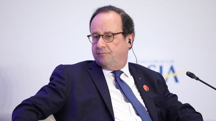 L'ancien président de la République François Hollande lors d'une conférence à&nbsp;Qionghai (Chine), le 26 mars 2019. (DYCJ / IMAGINECHINA / AFP)