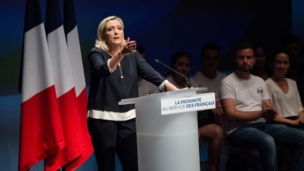 La présidente du Rassemblement national, Marine Le Pen, lors de l'université d'été du parti, le 15 septembre 2019 à Fréjus (Var).&nbsp; (CLEMENT MAHOUDEAU / AFP)