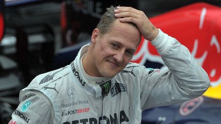 Le pilote allemand Michael Schumacher, le 25 novembre 2012, &agrave; Sao Paulo (Br&eacute;sil). (YASUYOSHI CHIBA / AFP)