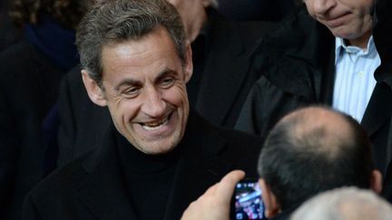 Nicolas Sarkozy, ancien pr&eacute;sident de la R&eacute;publique, le 16 mars 2014 au parc des Princes (Paris).&nbsp; (JEFFROY GUY / SIPA)