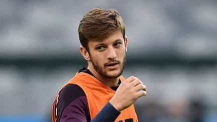 L'Anglais Adam Lallana à l'échauffement