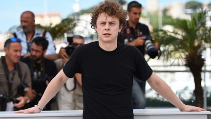 Le youtubeur Norman Thavaud, le 17 mai 2015, au Festival de Cannes. (ANNE-CHRISTINE POUJOULAT / AFP)