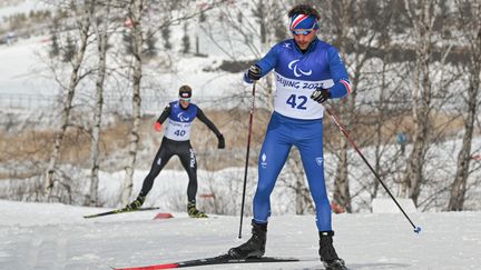 Benjamin Daviet lors des Jeux paralympiques, le 12 mars 2022. (MOHD RASFAN / AFP)