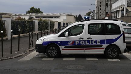 Un véhicule de police lors d'une intervention à Argenteuil (Val-d'Oise), le 21 juillet 2016. (MATTHIEU ALEXANDRE / AFP)