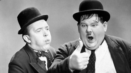 Stan Laurel et Oliver Hardy dans le film "Way Out West" (1937). (ARCHIVES DU 7EME ART / AFP)