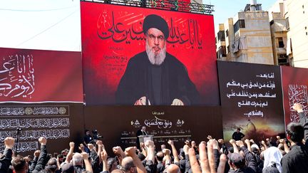 Hassan Nasrallah, the leader of Hezbollah, on a giant screen on August 9, 2022 in Beirut, Lebanon. (ANWAR AMRO / AFP)