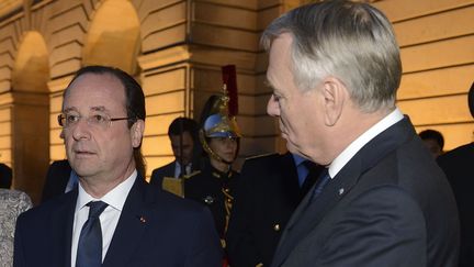 Le pr&eacute;sident de la R&eacute;publique, Fran&ccedil;ois Hollande, et le Premier ministre, Jean-Marc Ayrault, le 27 mars 2014, &agrave; l'h&ocirc;tel Matignon, &agrave; Paris. (WITT / REVELLI BEAUMONT / SIPA)