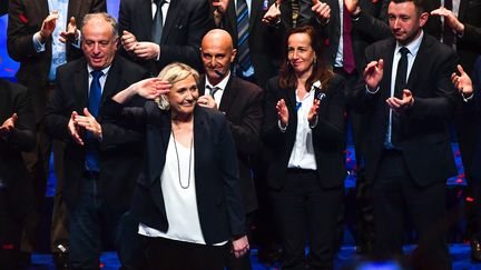 Marine Le Pen à l'issue de son intervention en clôture du 16e congrès du Front national, au cours de laquelle elle a annoncé le future nouveau nom que devront valider les militants, le Rassemblement national, à Lille, dimanche 11 mars 2018.&nbsp; (PHILIPPE HUGUEN / AFP)