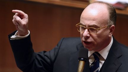 Le ministre d&eacute;l&eacute;gu&eacute; au Budget, Bernard Cazeneuve, le 15 octobre 2013, lors de la s&eacute;ance des questions au gouvernement, &agrave; l'Assembl&eacute;e nationale, &agrave; Paris. (ERIC FEFERBERG/AFP)