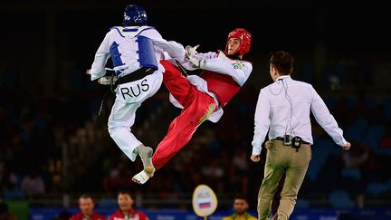 Taekwondo. JO Rio de Janeiro, Brésil. 18 août 2016.&nbsp;Le russe Alexey Denisenko contre le jordanien Ahmad Abughaush catégorie 68kg.&nbsp; (LAURENCE GRIFFITHS / GETTY IMAGES)