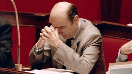 Le Premier ministre Alain Juppé à l'Assemblée nationale, le 12 décembre&nbsp;1995. (PATRICK KOVARIK / AFP)