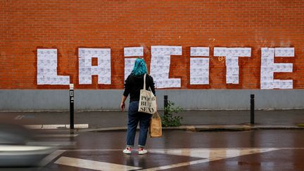 Affiche sur un mur à Montreuil (Seine-Saint-Denis). Photo d'illustration. (- / AFP)