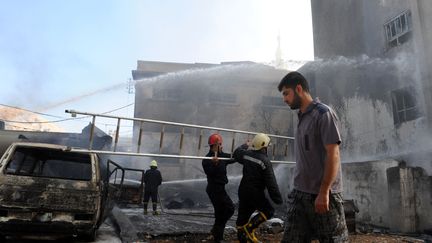 Une bombe a explos&eacute; dans le centre de Damas, pr&egrave;s de l'h&ocirc;tel des observateurs de l'ONU en Syrie le 15 ao&ucirc;t 2012 (photo diffus&eacute;e par l'agence de presse officielle syrienne). ( SANA / AFP)