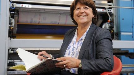 face à la crise qui menace de s'étendre à toute la zone euro, Martine Aubry fait ses propositions. (afp)