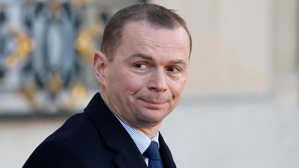 Le ministre du Travail, Olivier Dussopt, dans la cour de l'Elysée, à Paris, le 18 janvier 2023. (LUDOVIC MARIN / AFP)