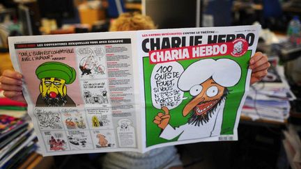 Couverture d'un numéro de Charlie Hebdo sorti lors de la victoire d'Ennahda à la présidentielle tunisienne en 2011. Il avait promis d'appliquer la Sharia comme source législative pri,ncipale dans le pays.
 (MARTIN BUREAU / AFP)