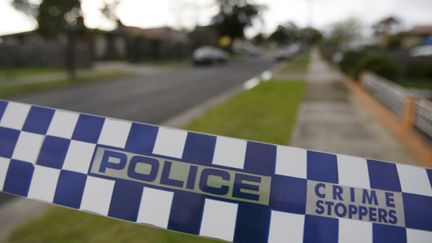 La police australienne a men&eacute; des perquisitions dans une maison du nord de Melbourne. (MICK TSIKAS / REUTERS)