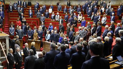 Les députés et ministres respectent une minute de silence à la mémoire de Thomas, jeune homme de 16 ans tué à Crépol (le 8 novembre 2023 à l'Assemblée nationale). (LUDOVIC MARIN / AFP)