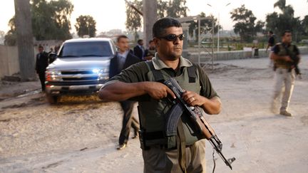 &nbsp; (Un membre de forces de sécurité privée en Irak. © REUTERS/Ceerwan Aziz)
