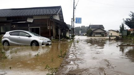 Une rue inondée dans la ville de Suzu, préfecture d'Ishikawa (Japon), le 21 septembre 2024. (TSUBASA NARISHIMA / YOMIURI / AFP)