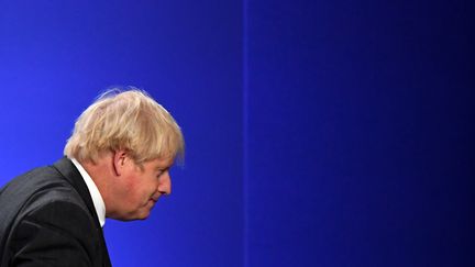 Boris Johnson lors de la COP26 à Glasgow en Ecosse, le 10 novembre 2021. (ANDY BUCHANAN / AFP)