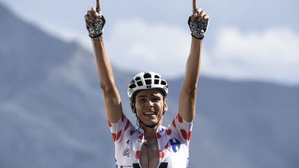 Le Français Warren Barguil (Sunweb) a remporté en solitaire la 18e étape du Tour de France 2017 au sommet de l'Izoard.
 (PHILIPPE LOPEZ / AFP)