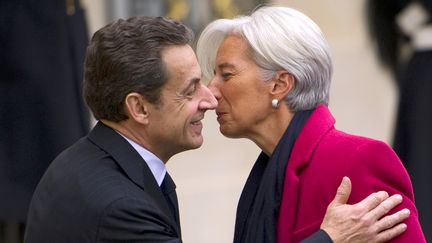 Nicolas Sarkozy et&nbsp;Christine Lagarde, le 11 janvier 2012 au Palais de l'Elys&eacute;e, &agrave; Paris. (LIONEL BONAVENTURE / AFP)