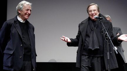 Le président de la Cinémathèque française, Costa Gavras, au côté du réalisateur américain William Friedkin, réunis pour l'ouverture du festival Toute la mémoire du monde, le 2 décembre 2013
 (Cinémathèque française)