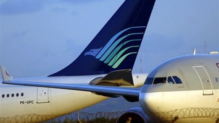 Un avions aux couleurs de la compagnie indonésienne Garuda (© AFP PHOTO - Sonny TUMBELAKA)