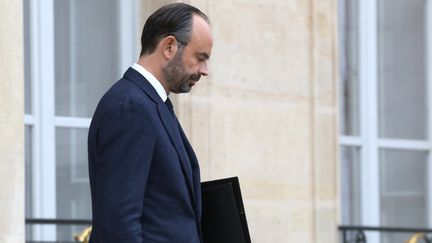 Le Premier ministre Édouard Philippe descendant les marches de l'Élysée. (LUDOVIC MARIN)