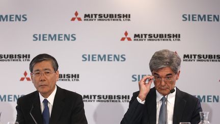 &nbsp; (Les patrons de Siemens et Mitsubishi Heavy Industries, en début de semaine à Paris © REUTERS/Christian Hartmann)