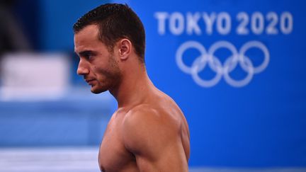 La déception et la détresse de Samir Aït Saïd après sa quatrième place au concours des anneaux dominé par la Chine avec les médailles d'or et d'argent pour Yang Liu et Hao You. Le Grec Eleftherios Petrounias s'adjuge le bronze.