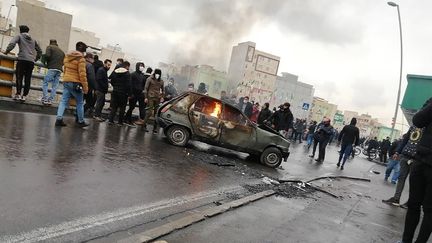 Des Iraniens manifestent contre la hausse du prix de l'essence,&nbsp;le 16 novembre 2019 à Téhéran (Iran). (AFP)