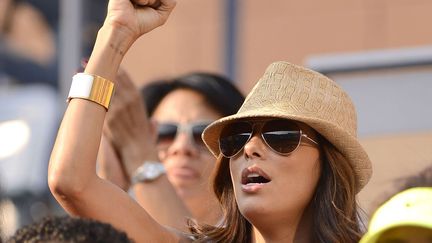 Avant, Eva Longoria squattait les bords des terrains de basket de son ch&eacute;ri Tony Parker. Depuis leur divorce, elle soutient les tenniswomen &agrave; l'US Open. Girl powa ! (ANTHONY BEHAR / SIPA)