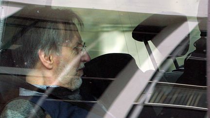 Michel Fourniret, en 2008, à la sortie de son procès.&nbsp; (FRANCOIS NASCIMBENI / AFP)