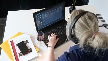 Une femme en télétravail. (VANESSA MEYER / MAXPPP)