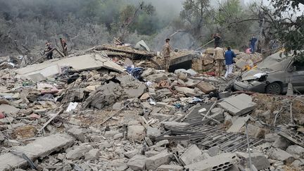 Des destructions dans le village de Aitou, au Liban, après des frappes israéliennes, le 14 octobre 2024. (AHMAD SAID / ANADOLU / AFP)