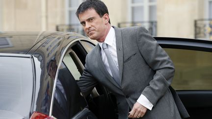 Manuel Valls quitte l'Elys&eacute;e, le 19 mars 2015, &agrave; Paris. (PATRICK KOVARIK / AFP)