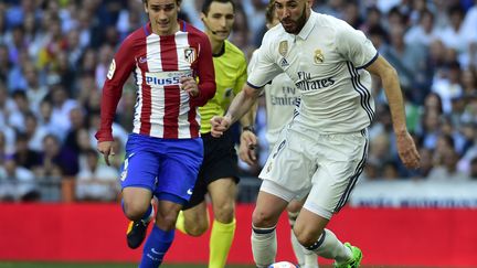 Antoine Griezmann face à Karim Benzema, un duel à suivre (GERARD JULIEN / AFP)