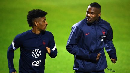 Marcus Thuram (à droite) et Kingsley Coman à l'entraînement avec les Bleus. (FRANCK FIFE / POOL)